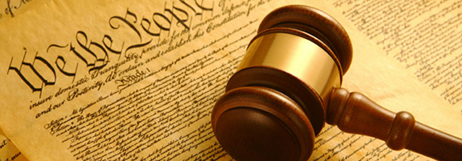 image of a gavel sitting on the constitution.